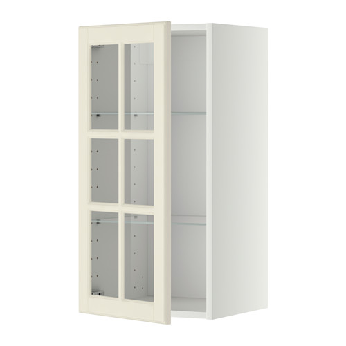 Esta imagen muestra un mueble de cocina METOD blanco de ikea con cuatro puertas de cristal, con un diseño tradicional con bordes biselados.