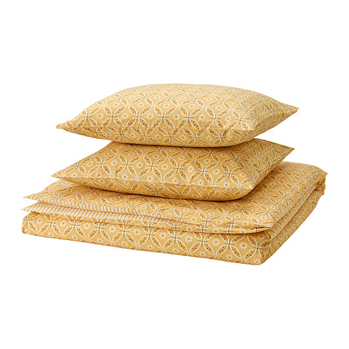 Conjunto de ropa de cama HAMNSENAP amarilla con estampado floral, cuidadosamente doblada, suave mezcla de algodón y viscosa.