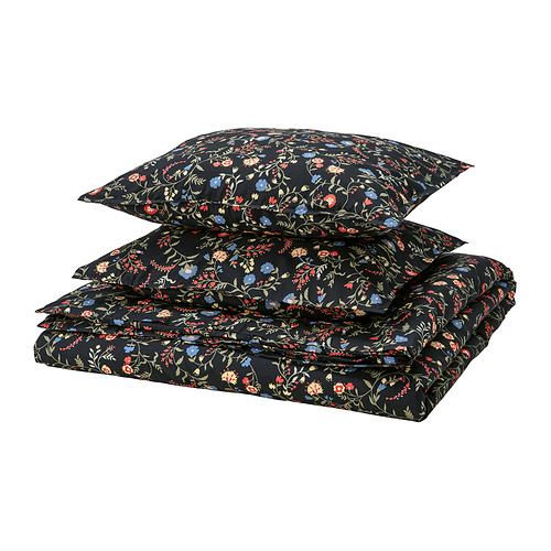 BRUDKRUSBÄR Conjunto nórdico floral negro confeccionado en algodón 100% con flores silvestres multicolores, doblado cuidadosamente.