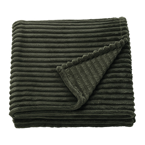 Una manta GULLSTRÅLE plegada de color verde oscuro con un diseño texturizado y bordes festoneados.