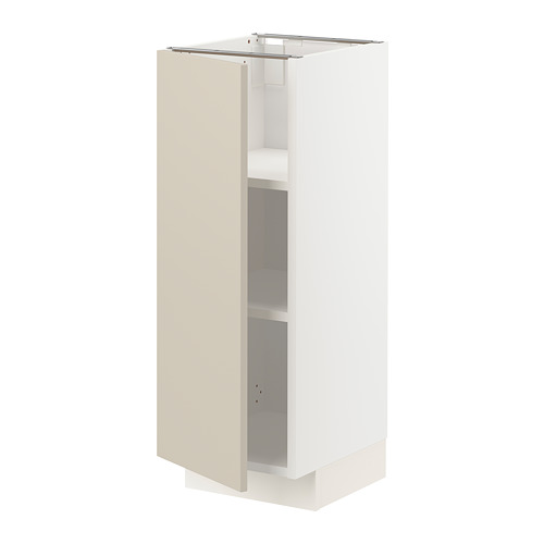 Un mueble de cocina METOD beige con bordes lisos, estantes ajustables y bisagras niqueladas. Es un diseño delgado, alto y rectangular.