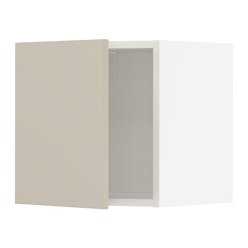 Un mueble de cocina METOD beige con un acabado liso y un diseño limpio, con una sola puerta montada sobre bisagras.