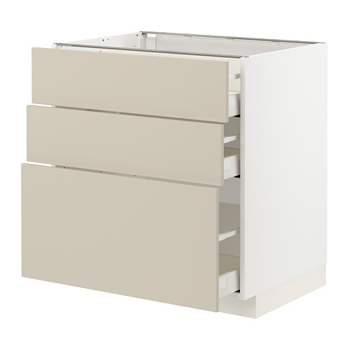 Un mueble de cocina METOD con frentes havstorp beige, con tres cajones de forma rectangular de líneas suaves y limpias.