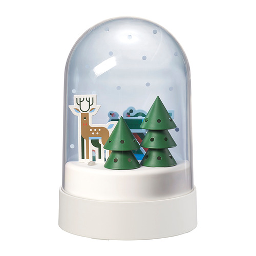 Decoración de mesa STRÅLA, blanco. Un diseño de renos, árboles verdes y bolas de nieve. Luz suave con temporizador de 6 horas.