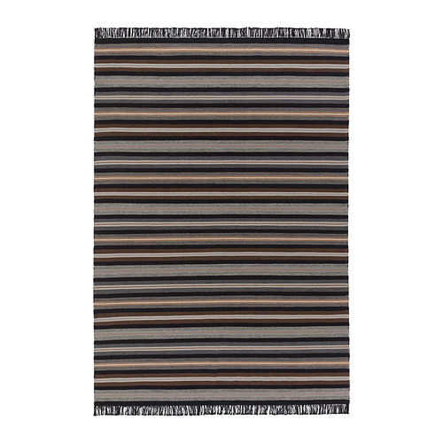 Alfombra de lana a rayas negras y marrones RÅVAROR, rectangular con bordes con flecos, tejida a mano.