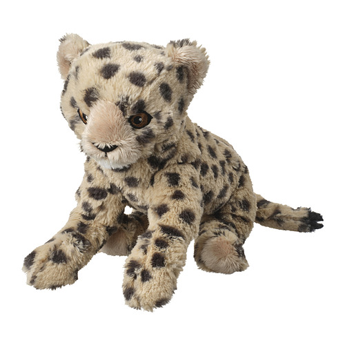 Juguete de leopardo de las nieves de peluche con beige y manchas oscuras, sentado, fondo blanco suave.