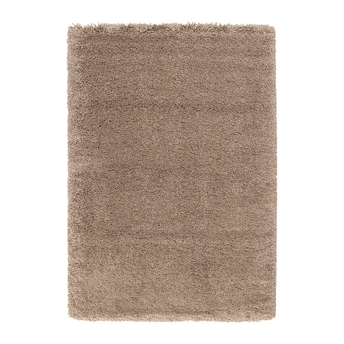 VOLLERSLEV alfombra peluda beige, suave y texturizada, rectangular con superficie afelpada.