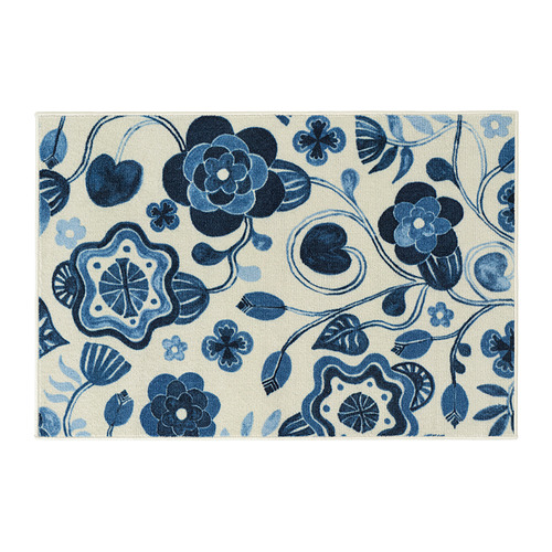 Alfombra KANTLINJE, beige claro con motivos florales azules, rectangular, afelpada, decorativa.