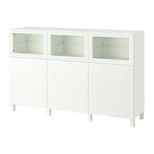 Aparador blanco BESTÅ con 3 puertas de cristal, bisagras modernas, rectangulares, de cierre suave.