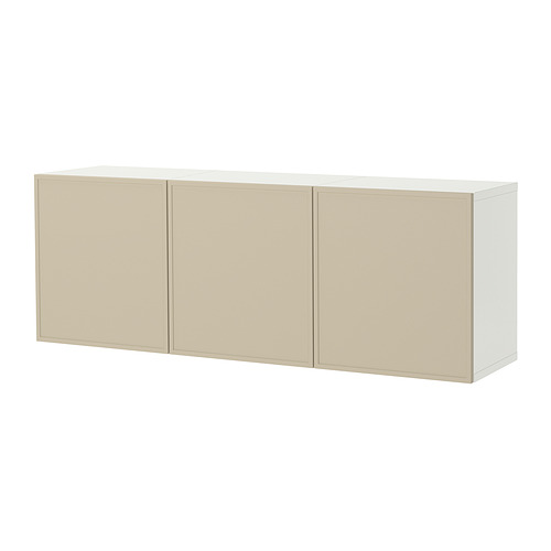 Mueble de pared de color crema Ikea BESTÅ. Diseño moderno con tres puertas, que ofrece una solución de almacenamiento aireada.