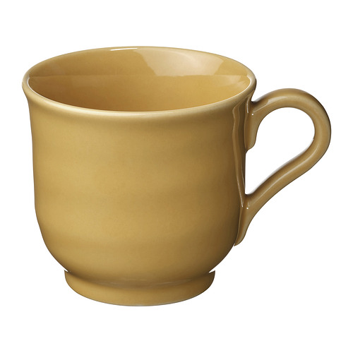 Taza SANDSKÄDDA en amarillo ocre; Cerámica, forma redondeada con mango robusto.
