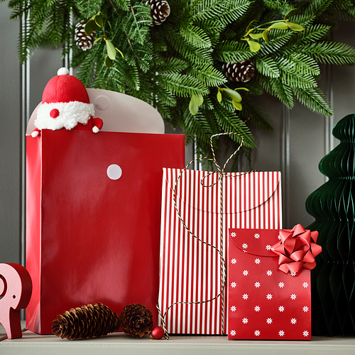 Bolsas de regalo con temática navideña, decoradas con gorro de Papá Noel, copos de nieve y piñas. Perfecto para envolver regalos de forma rápida y sencilla.