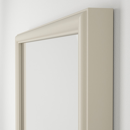 Espejo de pared con marco beige, diseño moderno, materiales de alta calidad, película de seguridad para protección.