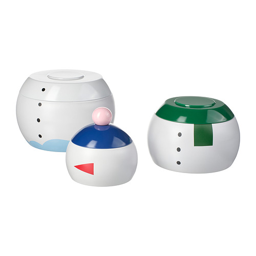 Tres coloridos recipientes esféricos con perillas en la parte superior, cada uno en blanco, verde y azul con divertidos marcadores faciales.