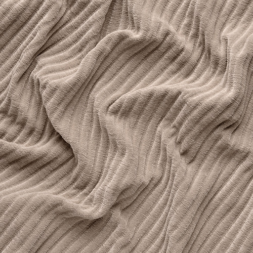 Primer plano del tejido de pana JÄTTEBO beige texturizado y suave, resaltando su diseño de madera profunda.