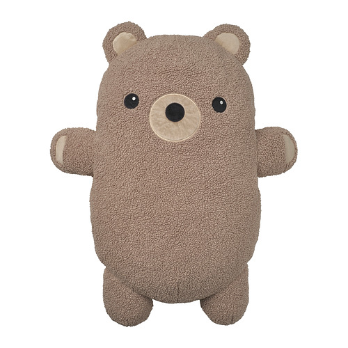 Adorable almohada de oso pardo, hecha de poliéster reciclado, forma cilíndrica con detalle de cara amigable.