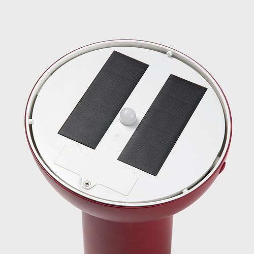 Luz exterior roja con paneles solares y base redonda. Diseño moderno, materiales de calidad.