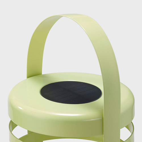 Silla minimalista de color verde claro con asiento circular negro, de diseño moderno y bien trabajado.