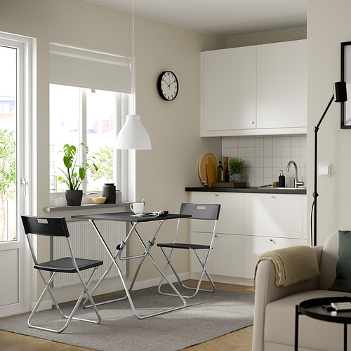 GUNDE / GUNDE, table and 2 folding chairs 2 of 4 open dialog