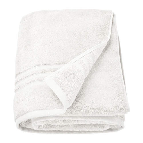 Toalla blanca de algodón orgánico BROKGLIM, doblada, afelpada, con elegante borde.