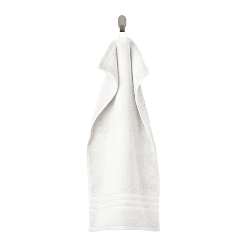 Toalla BROKGLIM: blanca, suave, de algodón orgánico, rectangular, con borde elegante, colgante.