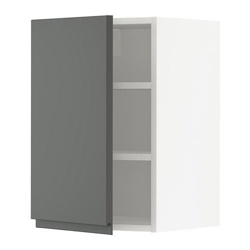 Un mueble de cocina moderno de color gris oscuro con un diseño elegante y minimalista y una sola puerta.