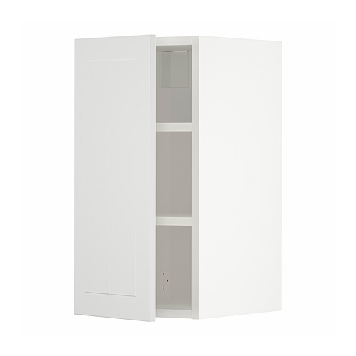 Mueble METOD blanquecino, rectangular delgado, estantes verticales, puertas blancas, estilo artesanal.