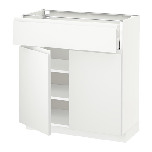 Un mueble de cocina METOD blanco con cajón y estante abierto, que forma parte de la serie voxtorp moderna y minimalista de ikea.