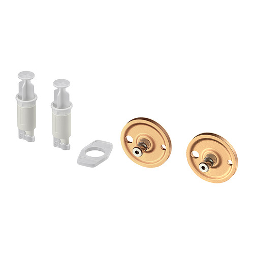 Dos adaptadores de bronce con tornillos y dos piezas adhesivas blancas.
