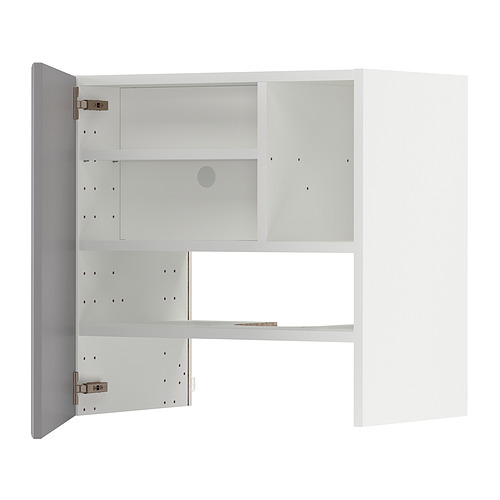 Armario METOD blanco abierto con estantes ajustables.