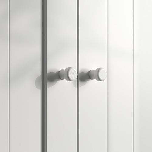 Una puerta GULLABERG blanca con pomos redondeados, con un diseño elegante y sencillo.