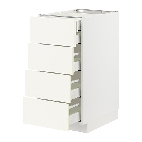 Mueble de cocina METOD blanco con cuatro cajones abiertos, diseño minimalista, bordes lisos.