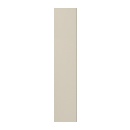 Una puerta de armario alta, rectangular y de color beige de HAVSTORP, con un diseño suave y moderno.