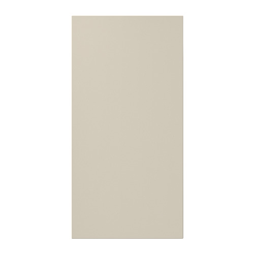 Una puerta de armario rectangular HAVSTORP de color beige. Es liso con líneas limpias, hecho de pintura acrílica y tableros de fibra.