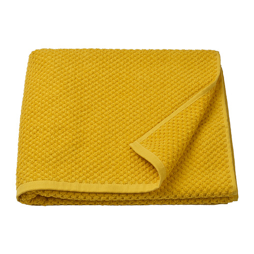Toalla GULVIAL de color amarillo brillante, doblada, suave 100% algodón, superficie gruesa y texturizada.