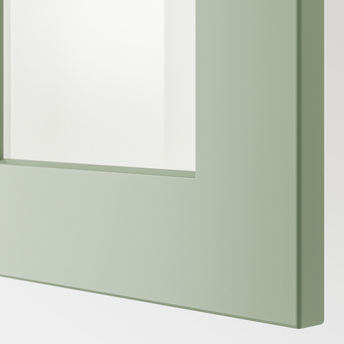Gabinete verde con puertas de vidrio; Acabado liso y lacado.
