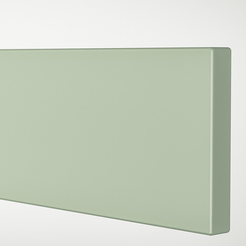 Frente de mueble de panel verde ranurado con superficie lisa y sin costuras.