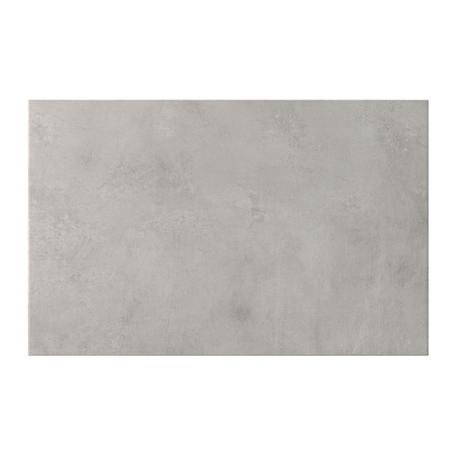 Una puerta de armario KALLVIKEN gris efecto hormigón. Es rectangular y está fabricado en laminado de melamina de alta presión con un acabado ligeramente texturizado.