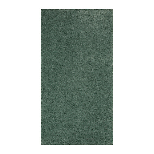 Alfombra rectangular verde STOENSE, textura primer plano.