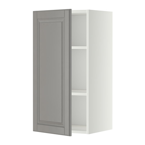Mueble de pared METOD en gris suave con estante ajustable y puerta biselada.