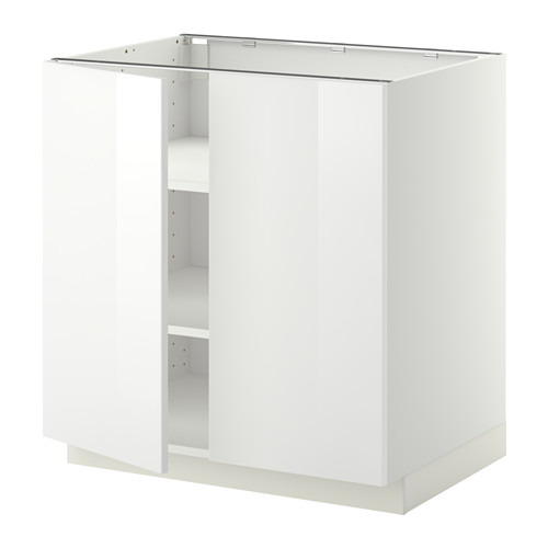 Un mueble de cocina METOD blanco de ikea. Es rectangular, tiene un acabado brillante y un estante abierto.