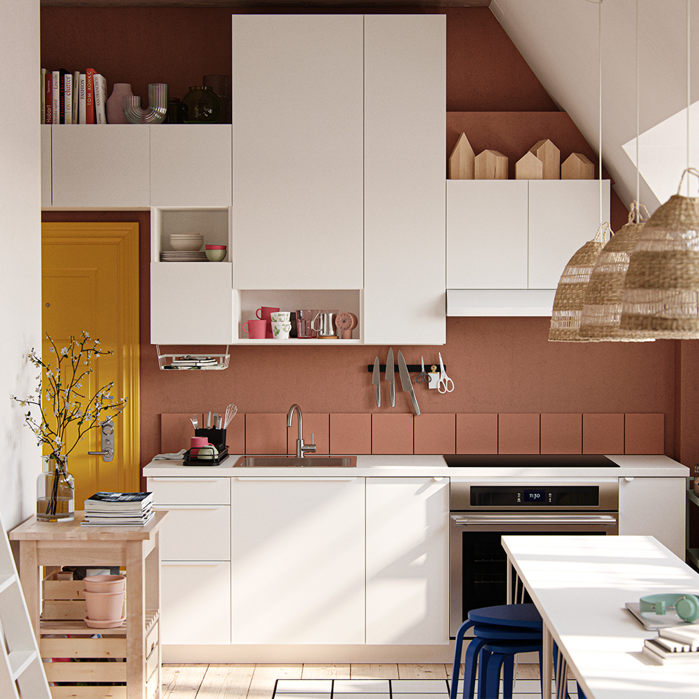 Kitchen with VALLSTENA kitchen fronts, a BEKVÄM kitchen cart in front, and KYRRE stools