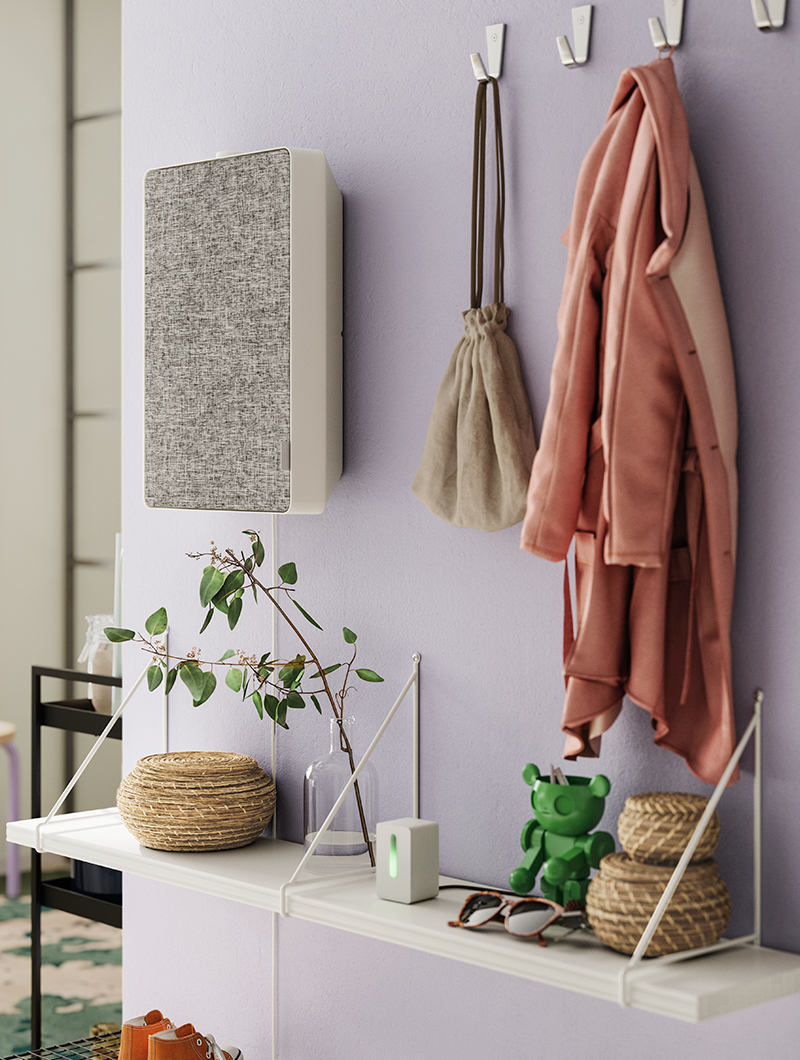 BLECKA hooks with a hanging jacket and BERGSHULT/PERSHULT wall shelf.