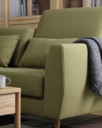green sofared armchair