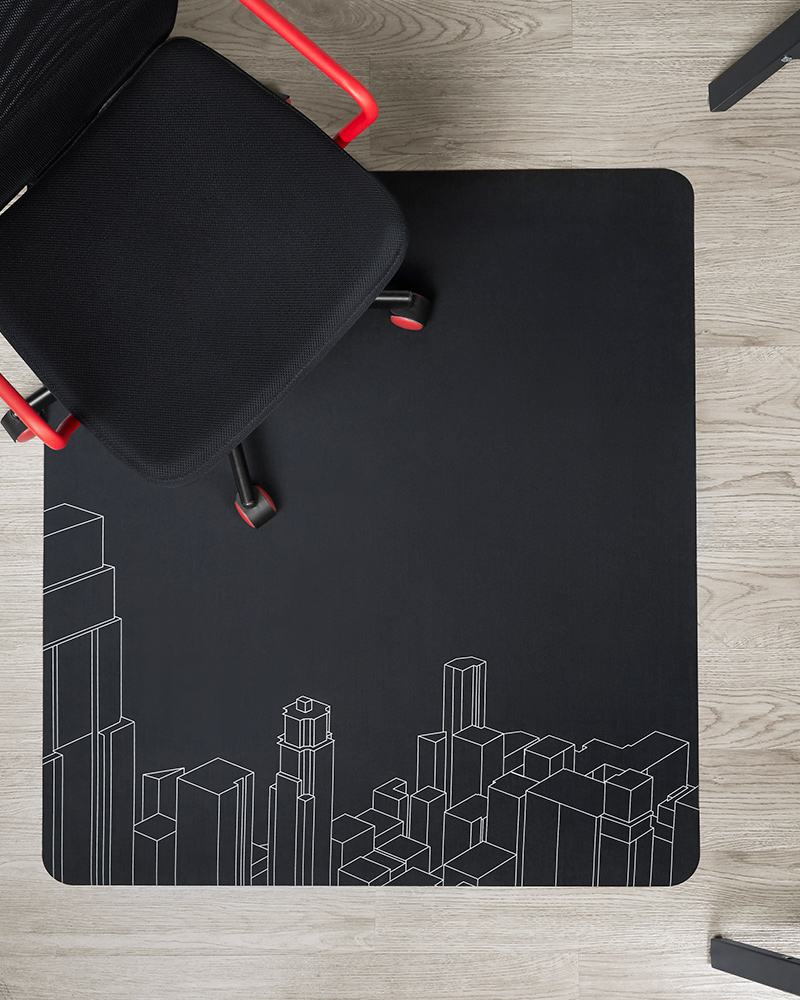 Una silla gamer HUVUDSPELARE vista desde arriba con un protector de piso LÅNESPELARE.