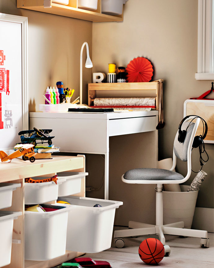 Workspace with desk, toys, chair and basketball.