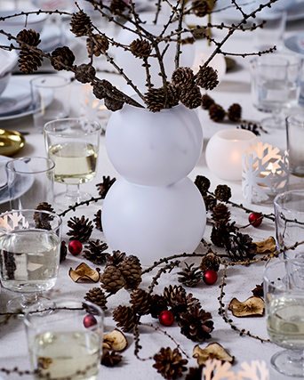 White vase decorating a Christmas table