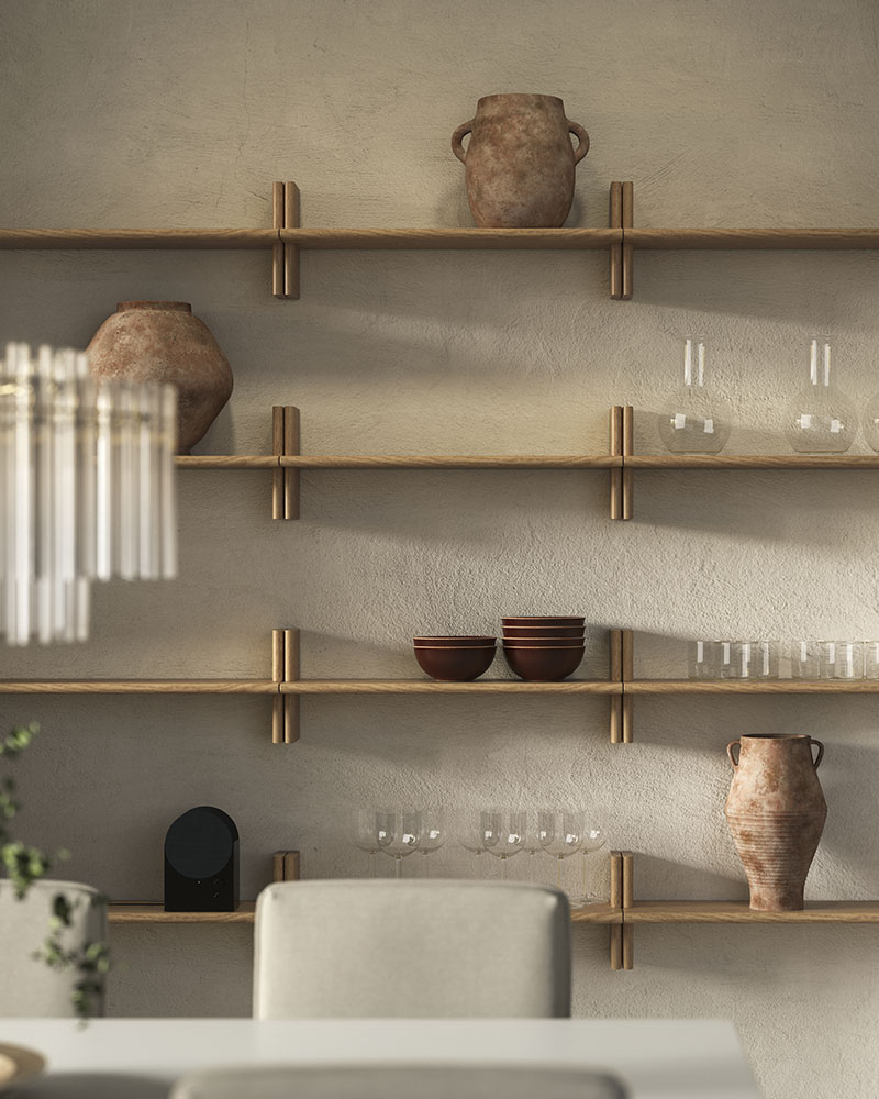 Cuatro sillas de conferencia LÄKTARE en chapa de abedul/blanco apiladas contra un mostrador, con mesas MITTZON verdes plegadas a su lado.