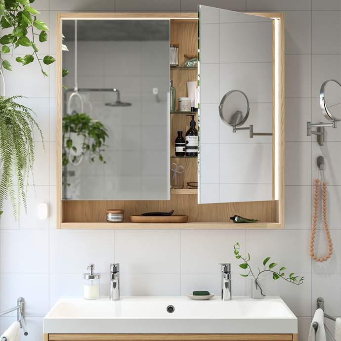 Double bathroom mirror cabinet with LED lighting and oak frame. Features open storage compartment and two mirrored doors with interior shelving
