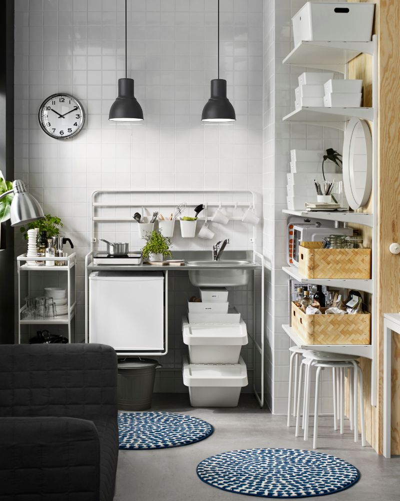 SUNNERSTA mini kitchen with shelves, LERSTA floor lamp, ROTSUND mirror, TILLREDA microwave and KNODD lidded bin.